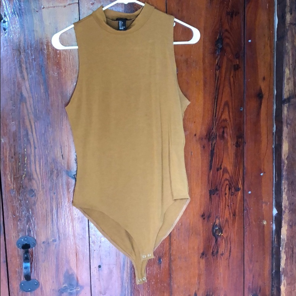 Tan body suit
